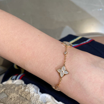 [kincade]STAR AND SUN 4 MOTIF WHITE MOP PINK GOLD BRACELET