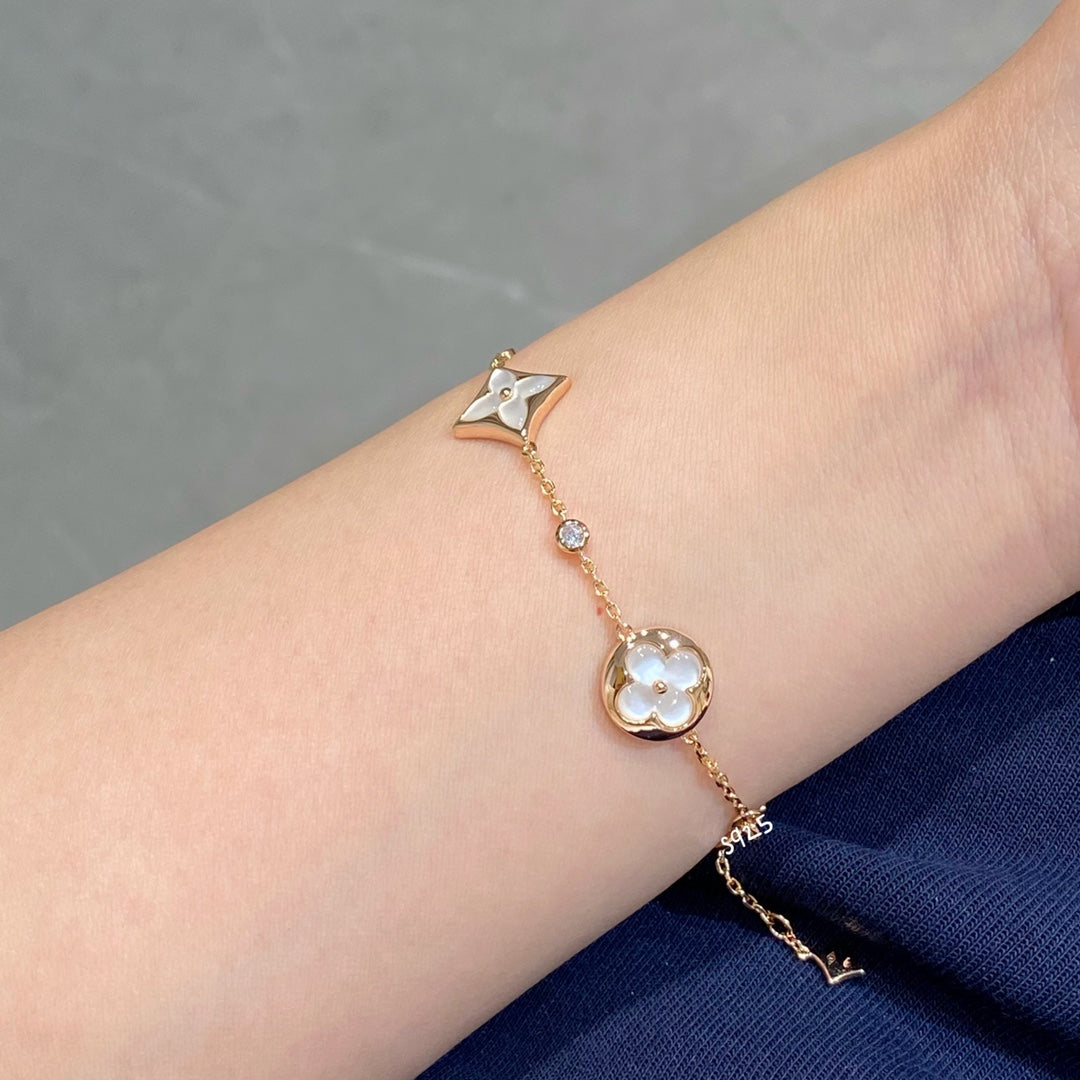 [kincade]STAR AND SUN 4 MOTIF WHITE MOP PINK GOLD BRACELET