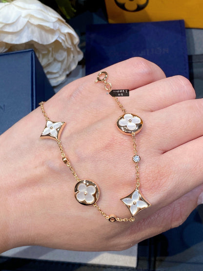 [kincade]STAR AND SUN 4 MOTIF WHITE MOP PINK GOLD BRACELET